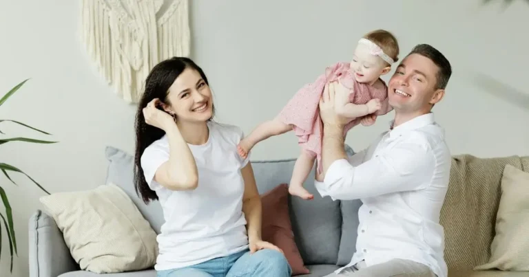 A cozy and well-organized baby nursery featuring a crib, rocking chair, and bookshelf, designed to provide a nurturing environment for a newborn.