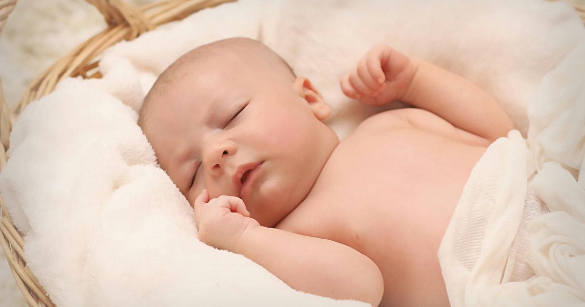 how to get newborn to sleep in bassinet